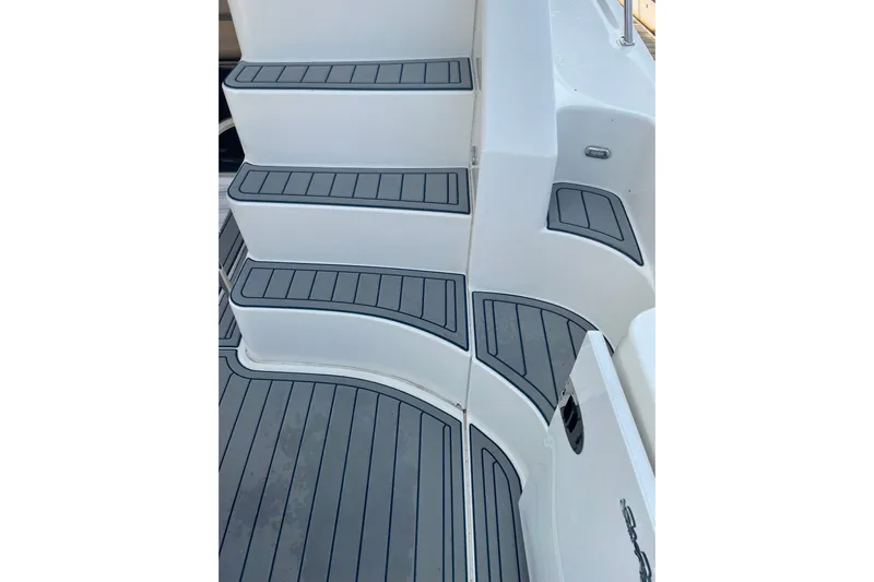Shenanhiggins Yacht Photos Pics Staircase on 2008 Sea Ray 47 Sedan Bridge yacht with sleek, modern design.