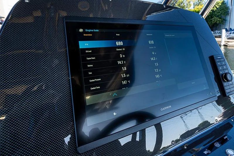  Yacht Photos Pics Dashboard of 2025 SACS Strider 11 displaying engine data on Garmin screen.