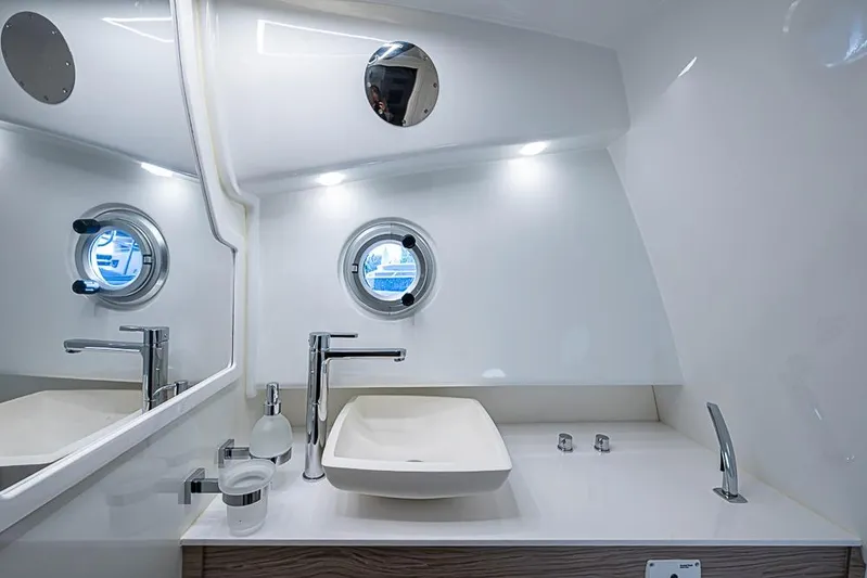  Yacht Photos Pics Luxurious bathroom interior of 2025 SACS Strider 11 yacht with modern fixtures.