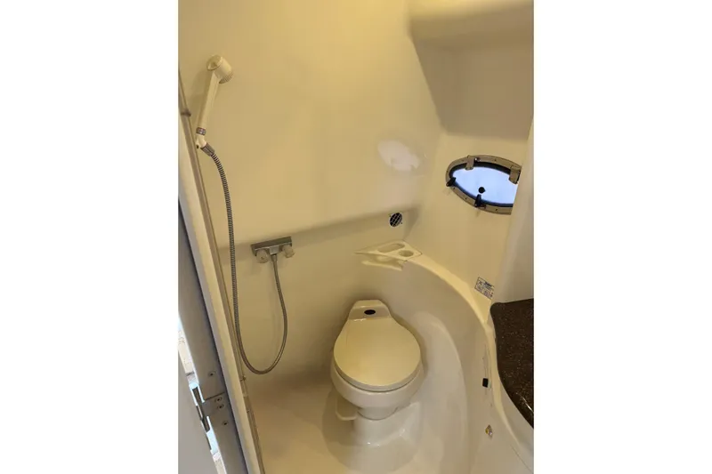  Yacht Photos Pics 2003 Formula 37 Performance Cruiser bathroom with shower and porthole window.