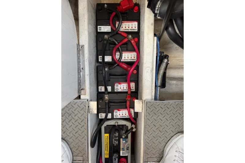  Yacht Photos Pics Battery compartment of a 2003 Formula 37 Performance Cruiser with red and black cables.