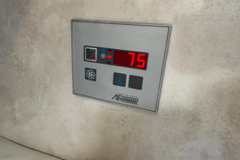  Yacht Photos Pics Digital control panel displaying temperature, set at 75 degrees, in a 2003 Formula 37 Performance Cruiser.