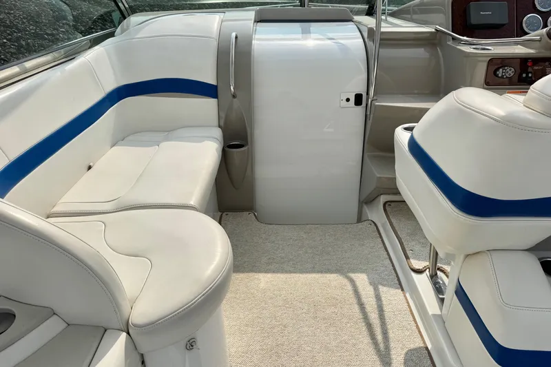  Yacht Photos Pics 2003 Formula 37 Performance Cruiser interior with white and blue seating.