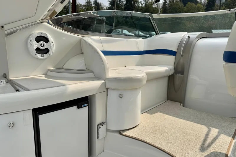  Yacht Photos Pics 2003 Formula 37 Performance Cruiser interior with white seating and blue accents.