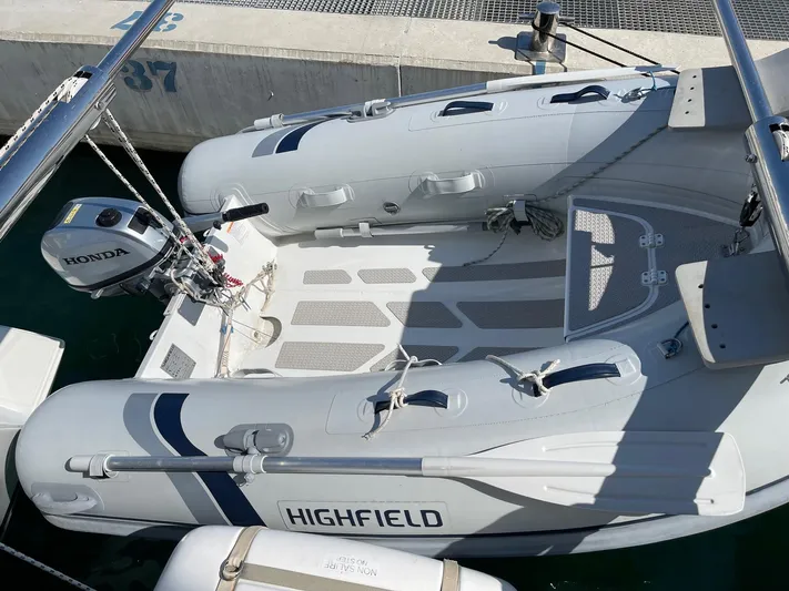 My Way Yacht Photos Pics Inflatable boat with Honda motor docked beside Lagoon 39, 2017 model.