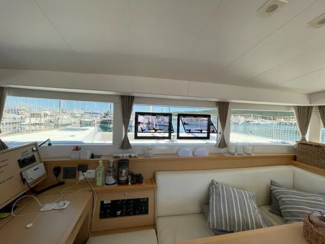 My Way Yacht Photos Pics Interior of 2017 Lagoon 39 catamaran with modern seating and large windows.