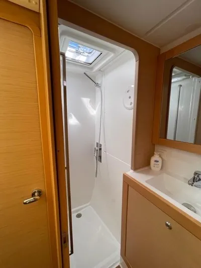 My Way Yacht Photos Pics Bathroom interior of 2017 Lagoon 39 yacht with shower and sink.