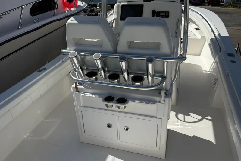  Yacht Photos Pics 2017 Regulator 25 boat interior with rod holders and dual seating.