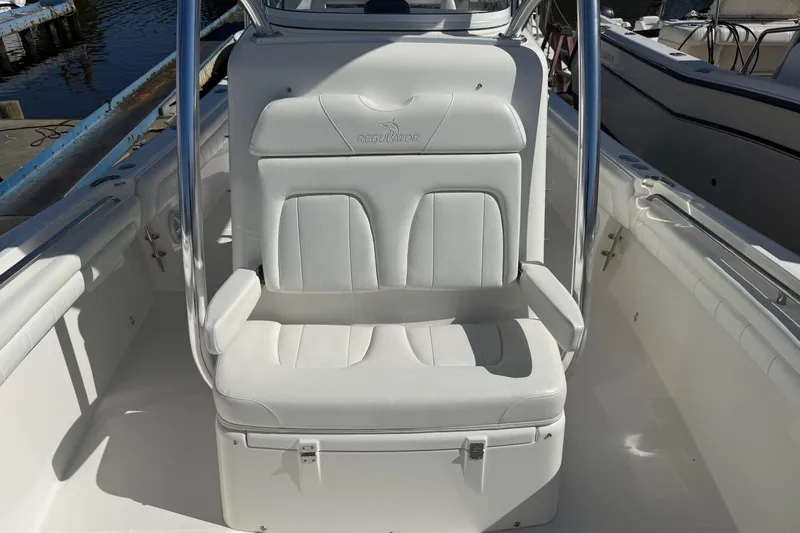  Yacht Photos Pics 2017 Regulator 25 boat seat with white upholstery and stainless steel frame.