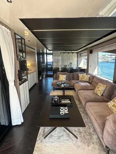  Yacht Photos Pics Luxurious interior of 2023 Cranchi Settantotto 78 yacht with modern furnishings and sea view.