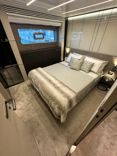  Yacht Photos Pics Luxurious bedroom interior of 2023 Cranchi Settantotto 78 yacht with modern design.