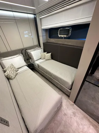  Yacht Photos Pics 2023 Cranchi Settantotto 78 yacht cabin with twin beds and modern decor.