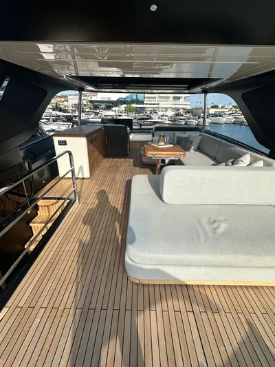  Yacht Photos Pics 2023 Cranchi Settantotto 78 yacht with spacious deck and modern seating area.