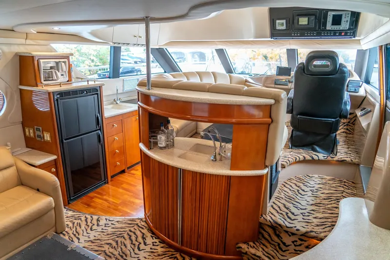  Yacht Photos Pics Luxurious interior of 2000 Carver 450 Voyager Pilothouse with modern amenities and stylish design.