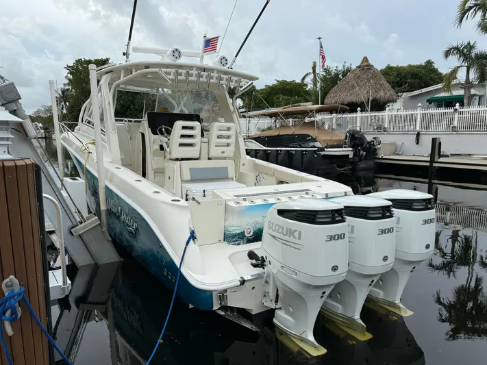  Yacht Photos Pics 2010 Hydra-Sports 3500 VX boat with triple Suzuki 300 engines docked in marina.