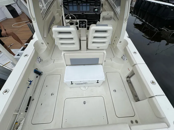  Yacht Photos Pics 2010 Hydra-Sports 3500 VX boat interior with seating and control panel.