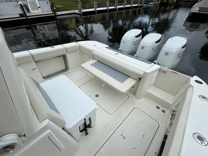  Yacht Photos Pics 2010 Hydra-Sports 3500 VX boat interior with seating and Suzuki outboard engines.