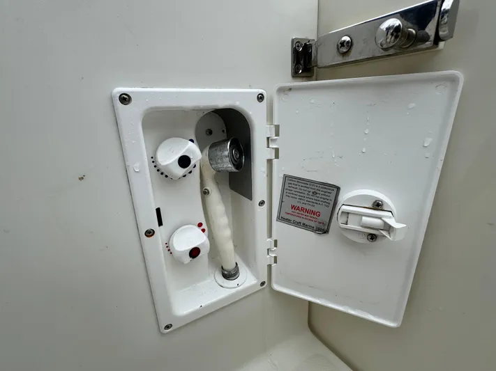  Yacht Photos Pics 2010 Hydra-Sports 3500 VX boat shower compartment with controls and hose.