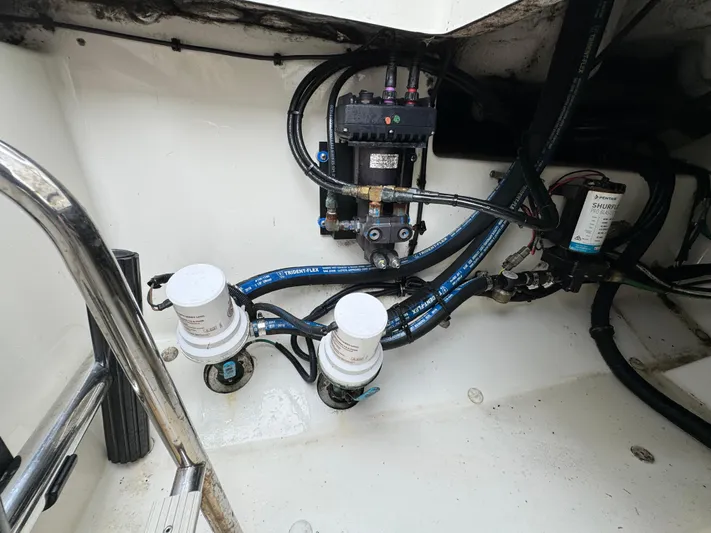  Yacht Photos Pics Engine compartment of a 2010 Hydra-Sports 3500 VX boat, showing fuel filters and wiring.