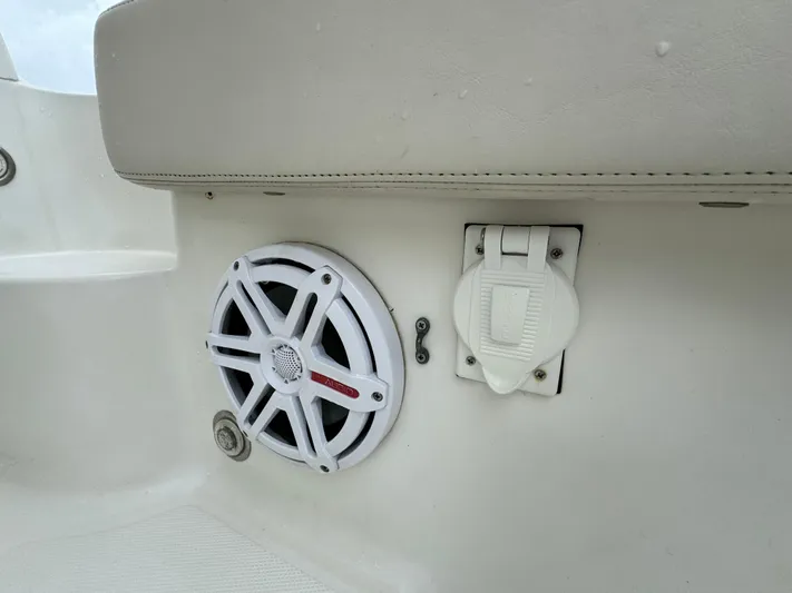  Yacht Photos Pics Hydra-Sports 3500 VX 2010 boat speaker and outlet on white interior panel.