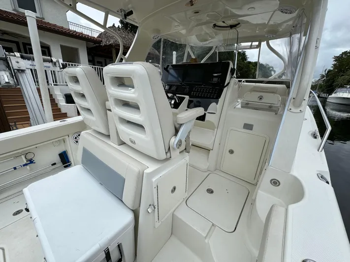  Yacht Photos Pics 2010 Hydra-Sports 3500 VX boat interior with helm and seating area.