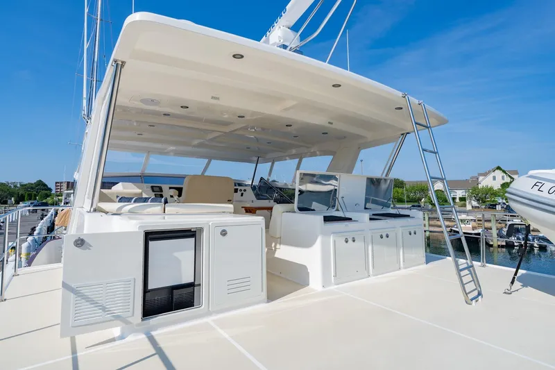 Dash Yacht Photos Pics 2016 Grand Banks 72 Aleutian RP yacht with spacious deck and modern amenities.