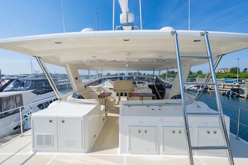 Dash Yacht Photos Pics Flybridge of 2016 Grand Banks 72 Aleutian RP yacht, featuring spacious seating and helm station.
