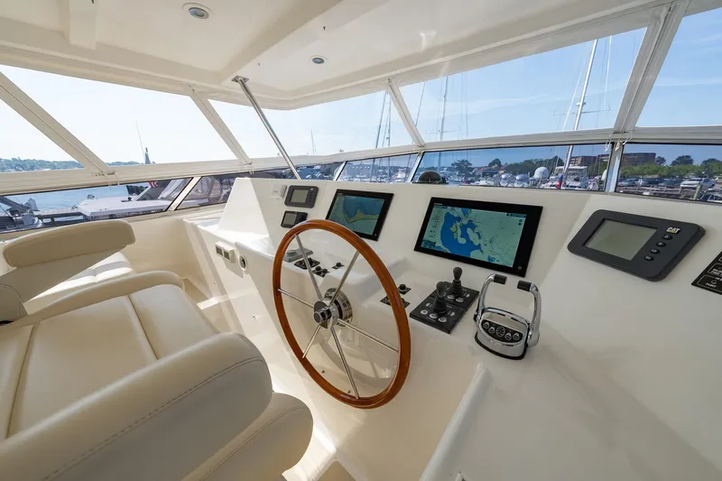 Dash Yacht Photos Pics Helm of 2016 Grand Banks 72 Aleutian RP yacht with navigation screens and controls.
