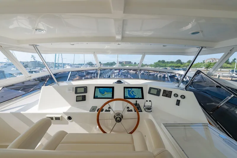Dash Yacht Photos Pics Interior view of 2016 Grand Banks 72 Aleutian RP yacht helm with navigation screens.