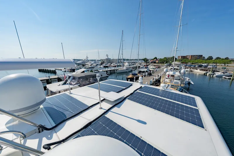 Dash Yacht Photos Pics 2016 Grand Banks 72 Aleutian RP yacht with solar panels docked at marina.