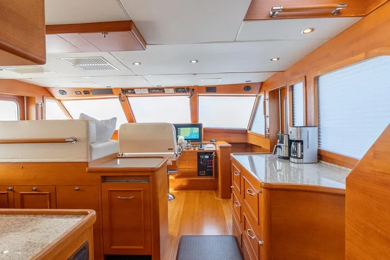 Dash Yacht Photos Pics Luxurious interior of 2016 Grand Banks 72 Aleutian RP yacht with modern amenities.