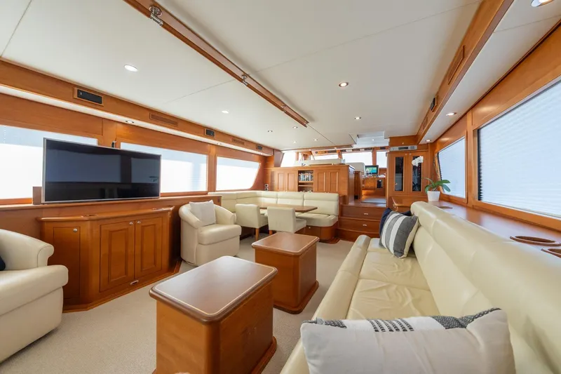 Dash Yacht Photos Pics Luxurious interior of 2016 Grand Banks 72 Aleutian RP yacht with elegant seating and modern amenities.