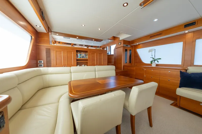 Dash Yacht Photos Pics Luxurious interior of 2016 Grand Banks 72 Aleutian RP yacht with elegant wood and leather furnishings.