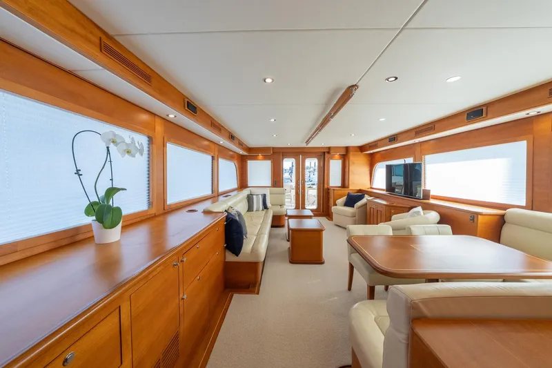 Dash Yacht Photos Pics Luxurious interior of 2016 Grand Banks 72 Aleutian RP yacht with elegant wood finishes.