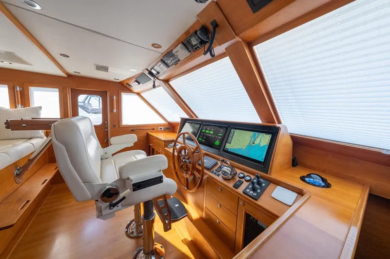 Dash Yacht Photos Pics Luxurious helm of 2016 Grand Banks 72 Aleutian RP yacht with modern navigation systems.