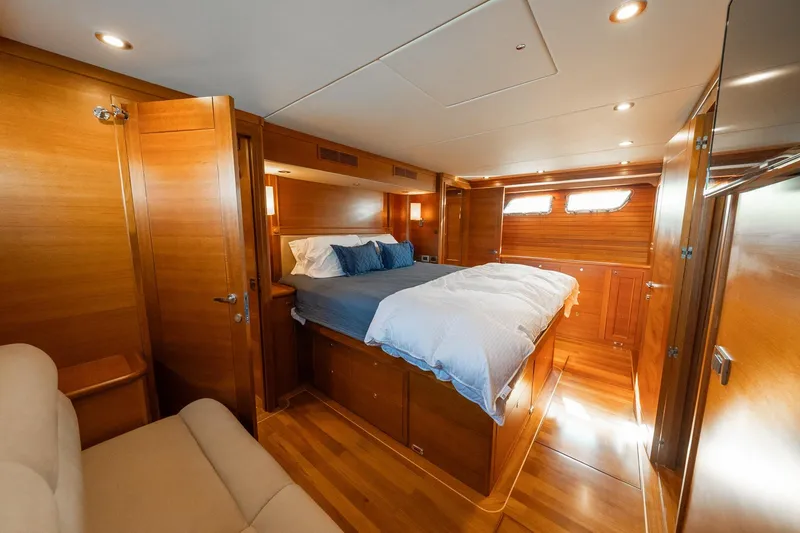 Dash Yacht Photos Pics Luxurious 2016 Grand Banks 72 Aleutian RP yacht cabin with elegant wood interior.