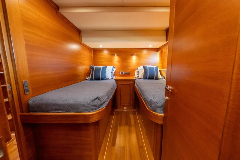 Dash Yacht Photos Pics Luxurious wooden cabin interior of 2016 Grand Banks 72 Aleutian RP yacht.