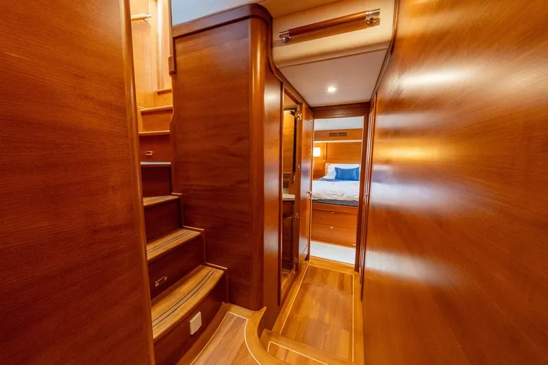 Dash Yacht Photos Pics Luxurious wooden interior of 2016 Grand Banks 72 Aleutian RP yacht cabin.