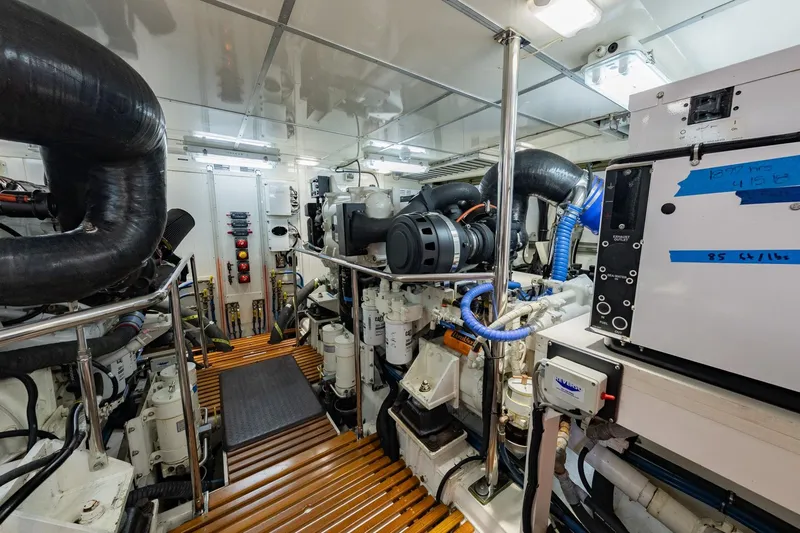 Dash Yacht Photos Pics Engine room of 2016 Grand Banks 72 Aleutian RP yacht, showcasing machinery and equipment.