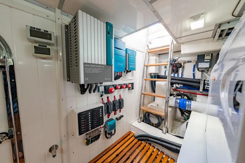 Dash Yacht Photos Pics Engine room of 2016 Grand Banks 72 Aleutian RP yacht, featuring electrical systems and equipment.
