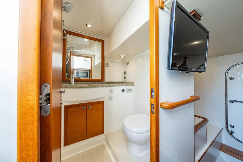 Dash Yacht Photos Pics Luxurious bathroom interior of 2016 Grand Banks 72 Aleutian RP yacht with modern amenities.