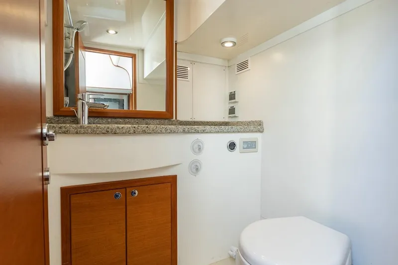 Dash Yacht Photos Pics Luxurious bathroom in 2016 Grand Banks 72 Aleutian RP yacht with modern fixtures.