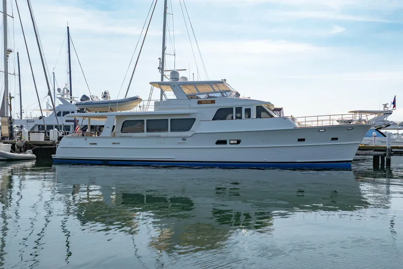 Dash Yacht Photos Pics 2016 Grand Banks 72 Aleutian RP yacht docked at marina, side view.