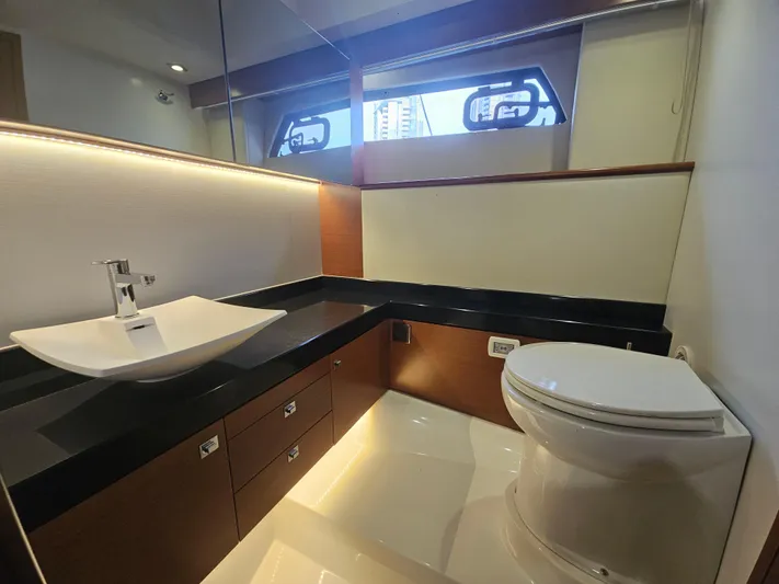 Yes Yacht Photos Pics Luxurious bathroom interior of 2016 Prestige 500 S yacht with modern sink and toilet.