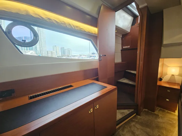 Yes Yacht Photos Pics Interior of 2016 Prestige 500 S yacht with stairs and window view.