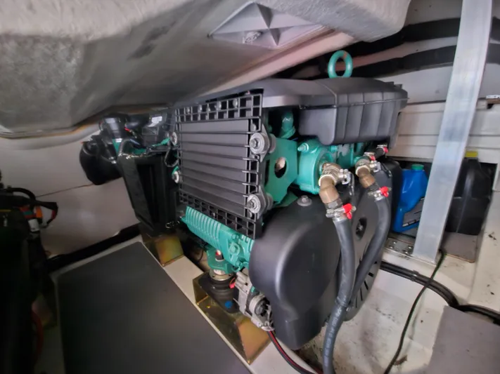 Yes Yacht Photos Pics Engine compartment of a 2016 Prestige 500 S yacht, showcasing mechanical components and wiring.