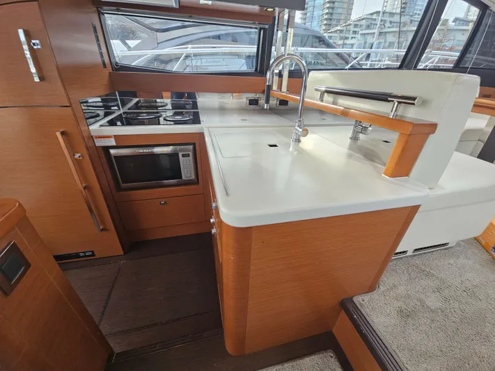 Yes Yacht Photos Pics Modern kitchen in 2016 Prestige 500 S yacht with sleek countertops and appliances.
