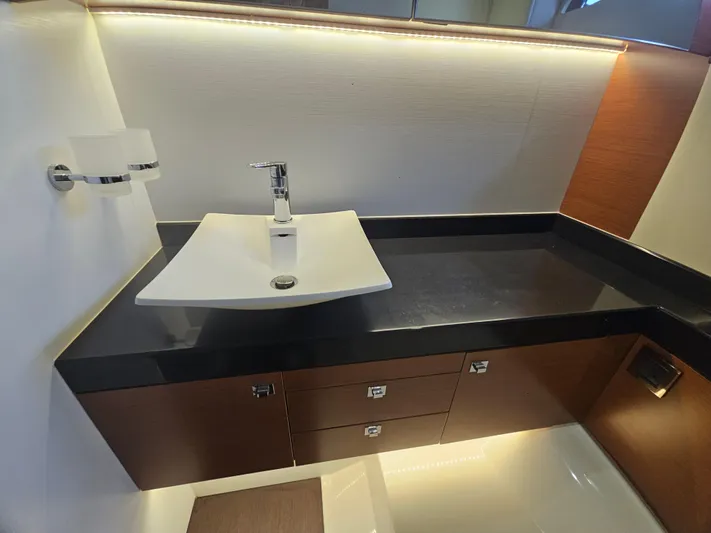 Yes Yacht Photos Pics Modern bathroom sink in 2016 Prestige 500 S yacht, featuring sleek design and elegant fixtures.