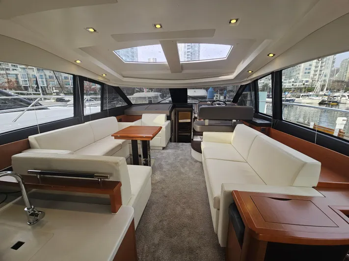 Yes Yacht Photos Pics Luxurious interior of a 2016 Prestige 500 S yacht with elegant seating and modern design.