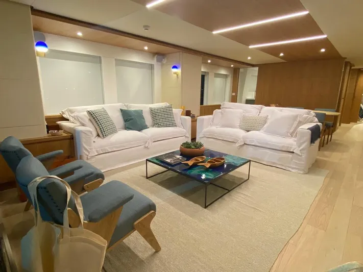  Yacht Photos Pics Luxurious interior of 2027 Inace Explora 90 yacht with elegant seating and modern decor.